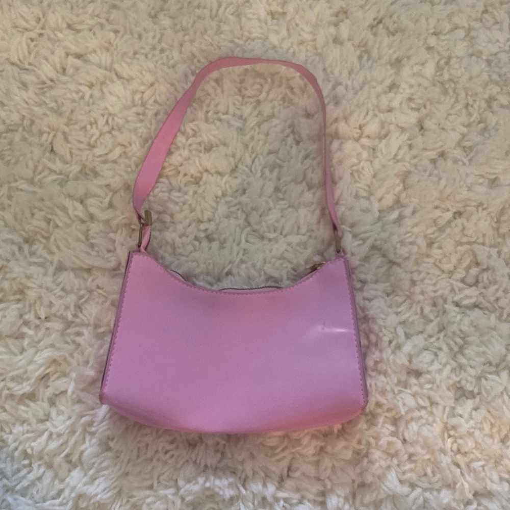 Pink and gold glossy hand bag